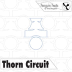 Continuous line in blue of product labeled 'Thorn Circuit' by Penguin Feats, featuring geometric shapes and text.